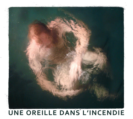 Pochette de : UNE OREILLE DANS L'INCENDIE - THEATRE DE L INCENDIE (DOUBLE CD)