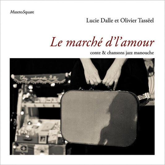 Pochette de : LE MARCHÉ D'L'AMOUR , CONTE & CHANSONS JAZZ MANOUCHE - DALLE LUCIE, TASSEEL OLIVIER (LIVRE CD)